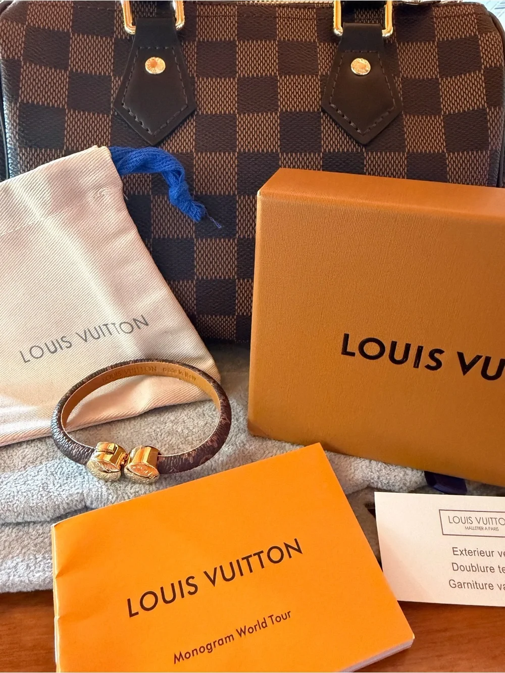 Louis Vuitton Mono Leather Gold tone Button Bracelet